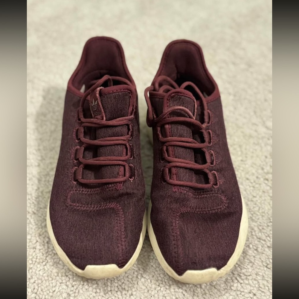 burgundy Adidas tennis shoes